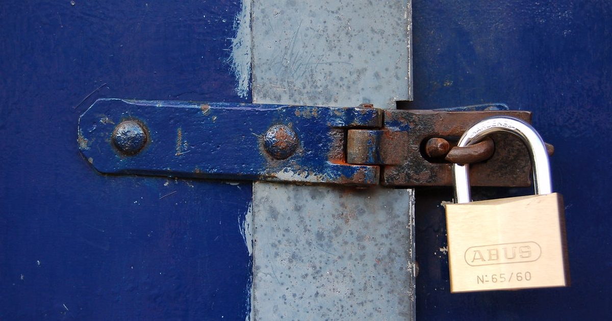 Padlock on a blue door